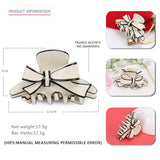 ACETATE DOUBLE SIDED BOW CLIP SHARK CLIP_CWAHA4238