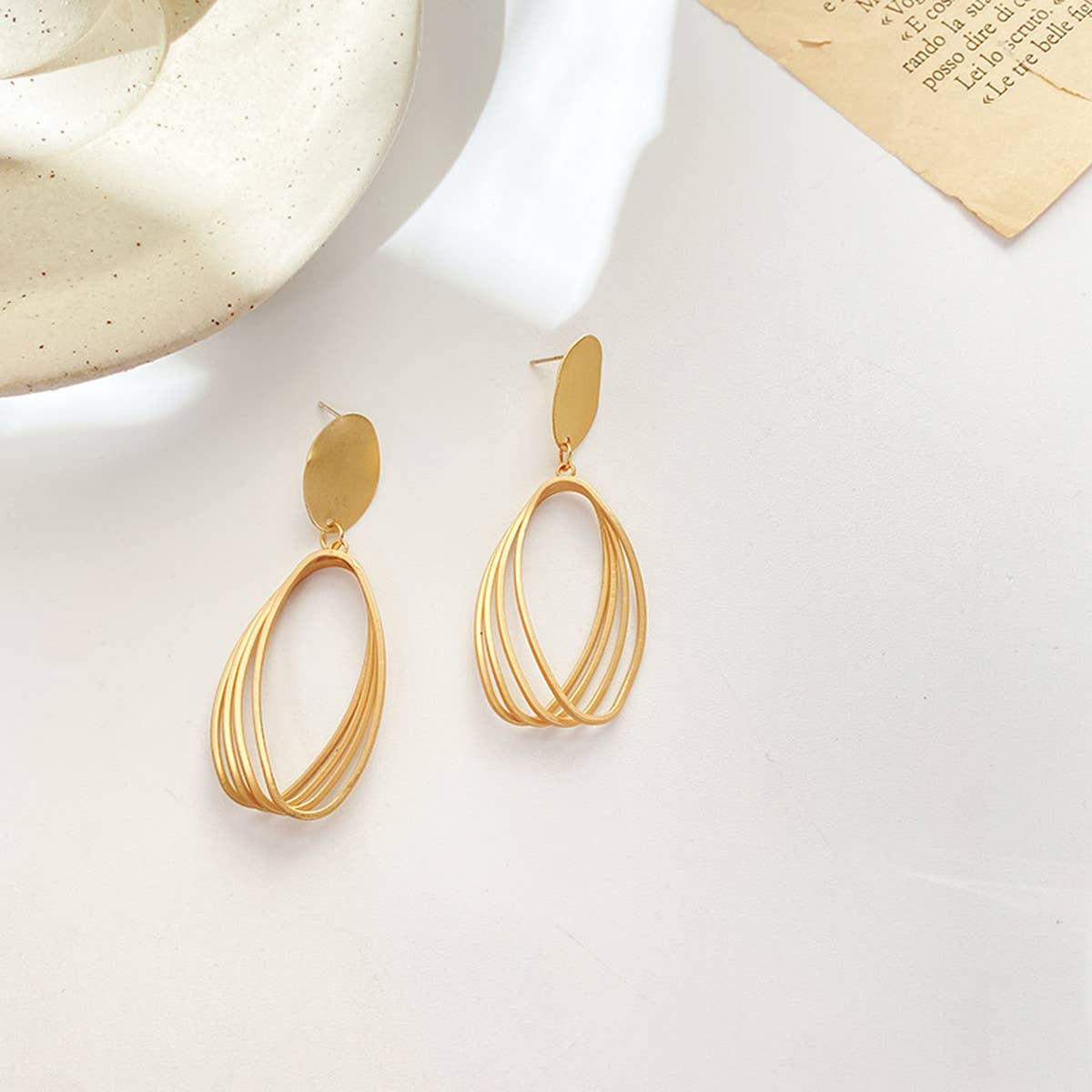 FASHIONABLE MATTE GOLD HOLLOW EARRINGS_CWAJE1630