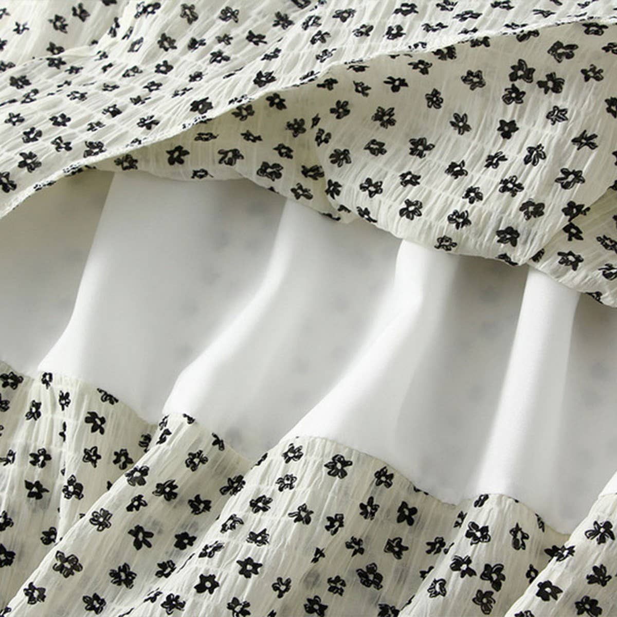 RUFFLE FLORAL SPLIT SLIMMING CAKE MIDI SKIRT_CWBMS0352