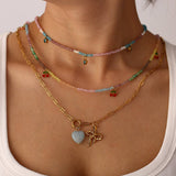 STAINLESS STEEL CHERRY NECKLACE WITH BOW CHARM_CWMM8826