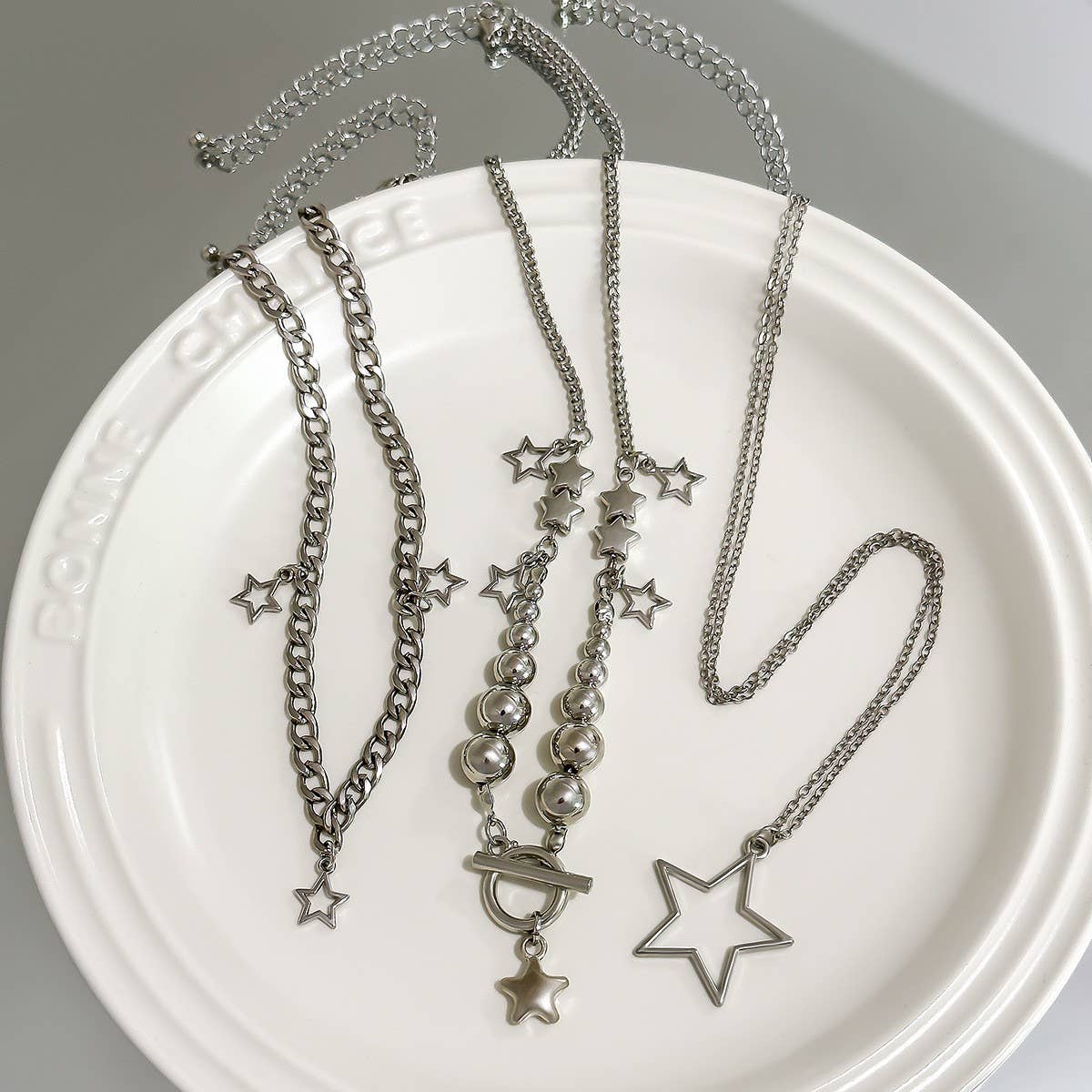BEADED NECKLACE WITH STAR SHAPED PENDANT TASSELS_CWAJE1158