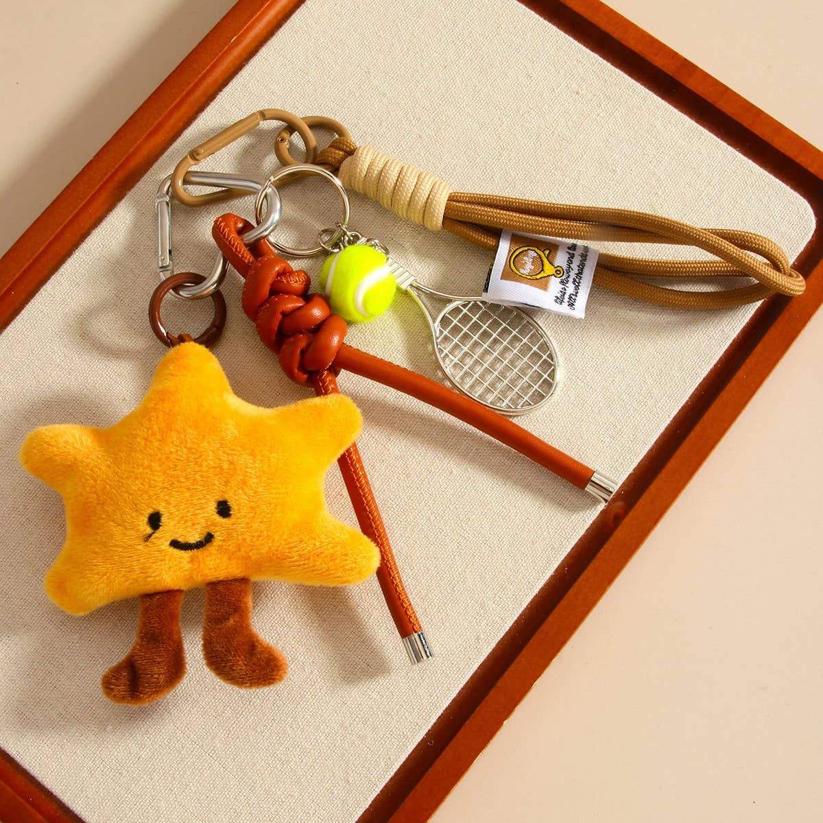 PLUSH STAR DOLL BAG CHARM WITH TENNIS KEYCHAIN_CWMM7834