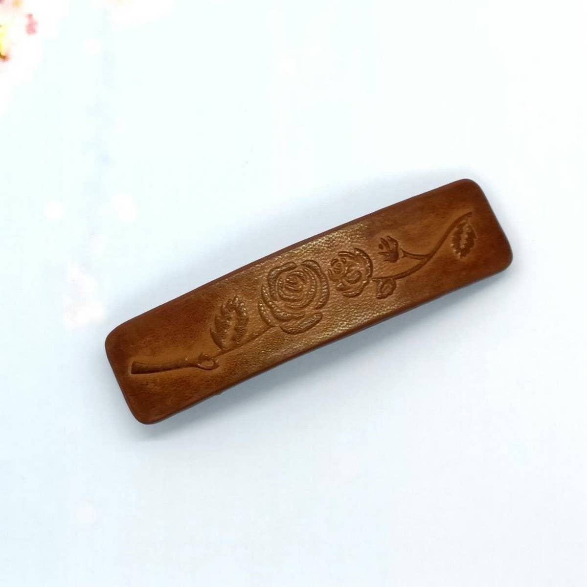 ROSE TOTEM CARVED PAINTED FAUX LEATHER HAIR CLIP_CWAHA6354