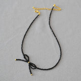 SIMPLE AND DELICATE BOW HANDMADE BEADED NECKLACE_CWAJE2136