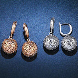HOLLOW ROUND EARRINGS_CWAJE0999
