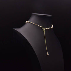 SIMPLE AND ELEGANT HIGH END BOW PEARL NECKLACE_CWAJE3829