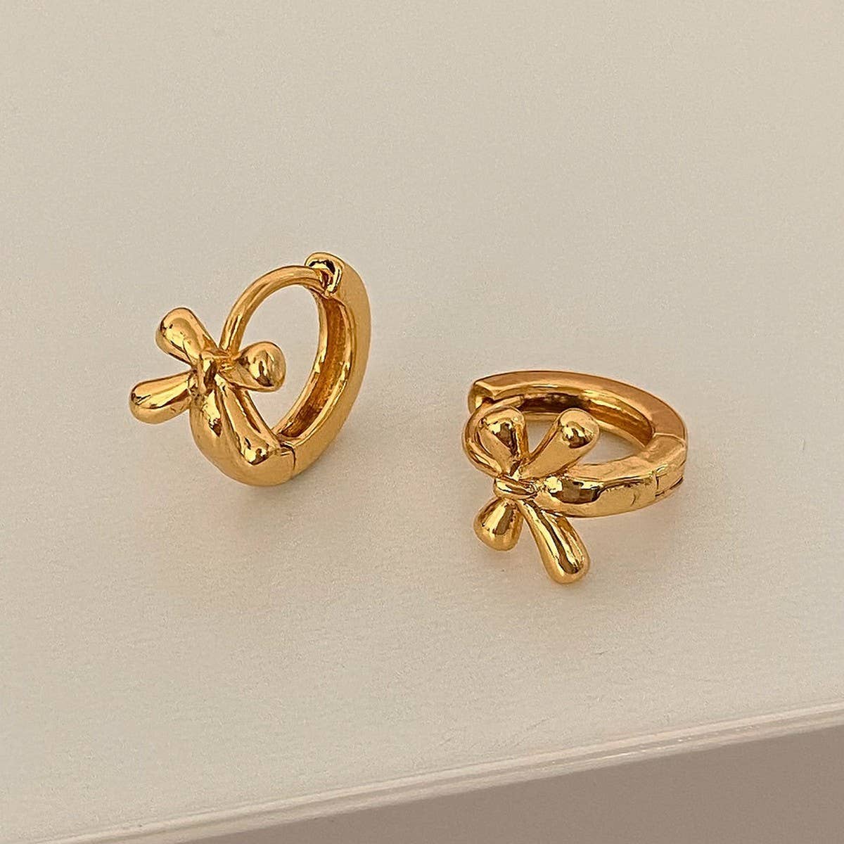 GENTLE AND VERSATILE HIGH END SIMPLE BOW EARRINGS_CWAJE3014