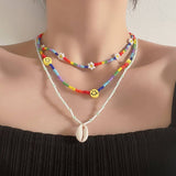 SHELL SMILEY DAISY BRAIDED NECKLACE_CWAJE1500