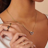 STAINLESS STEEL HEART ASYMMETRIC NECKLACE_CWMM5550
