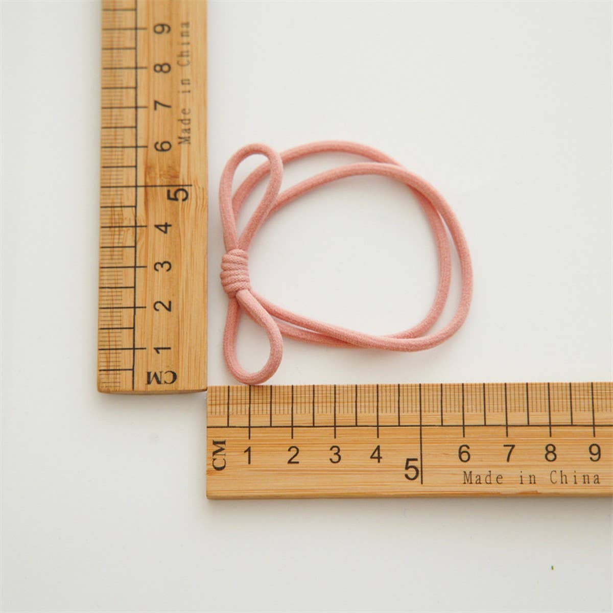 4 PIECES OF CANDY COLORED SIMPLE HAIR TIES_CWAHA1130