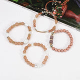 MULTI LAYERED MARBLED BEADED ELASTIC CORD BRACELET_CWAJE2224