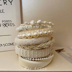 RETRO LOVE TWIST PEARL HEADBAND_CWAHA0829