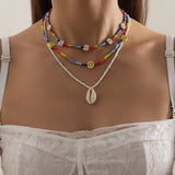 SHELL SMILEY DAISY BRAIDED NECKLACE_CWAJE1500