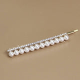 A PAIR OF ELEGANT PEARL AND RHINESTONE HAIR PIN_CWAHA1232