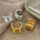 TEMPERAMENTAL AND FASHIONABLE SEMI ARC EARRINGS_CWAJE3124