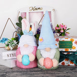 EASTER EARS BUNNY HOLDING EGG DWARF DOLL_CWMM3477