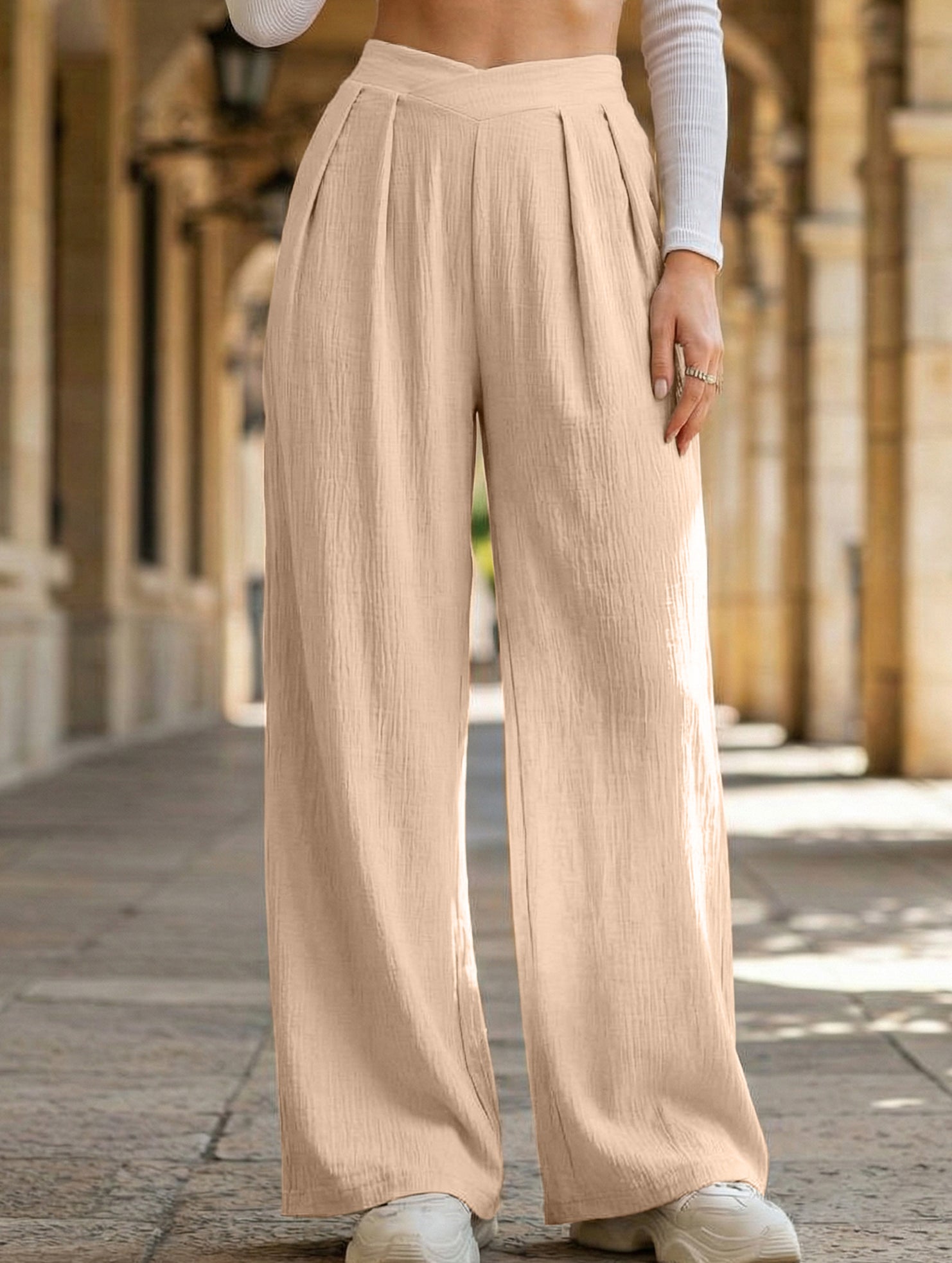 Cross-pleated high-waisted loose-fitting trousers