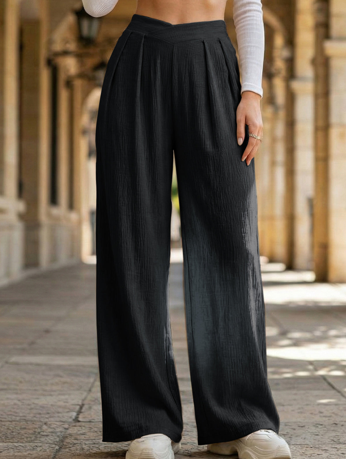 Cross-pleated high-waisted loose-fitting trousers