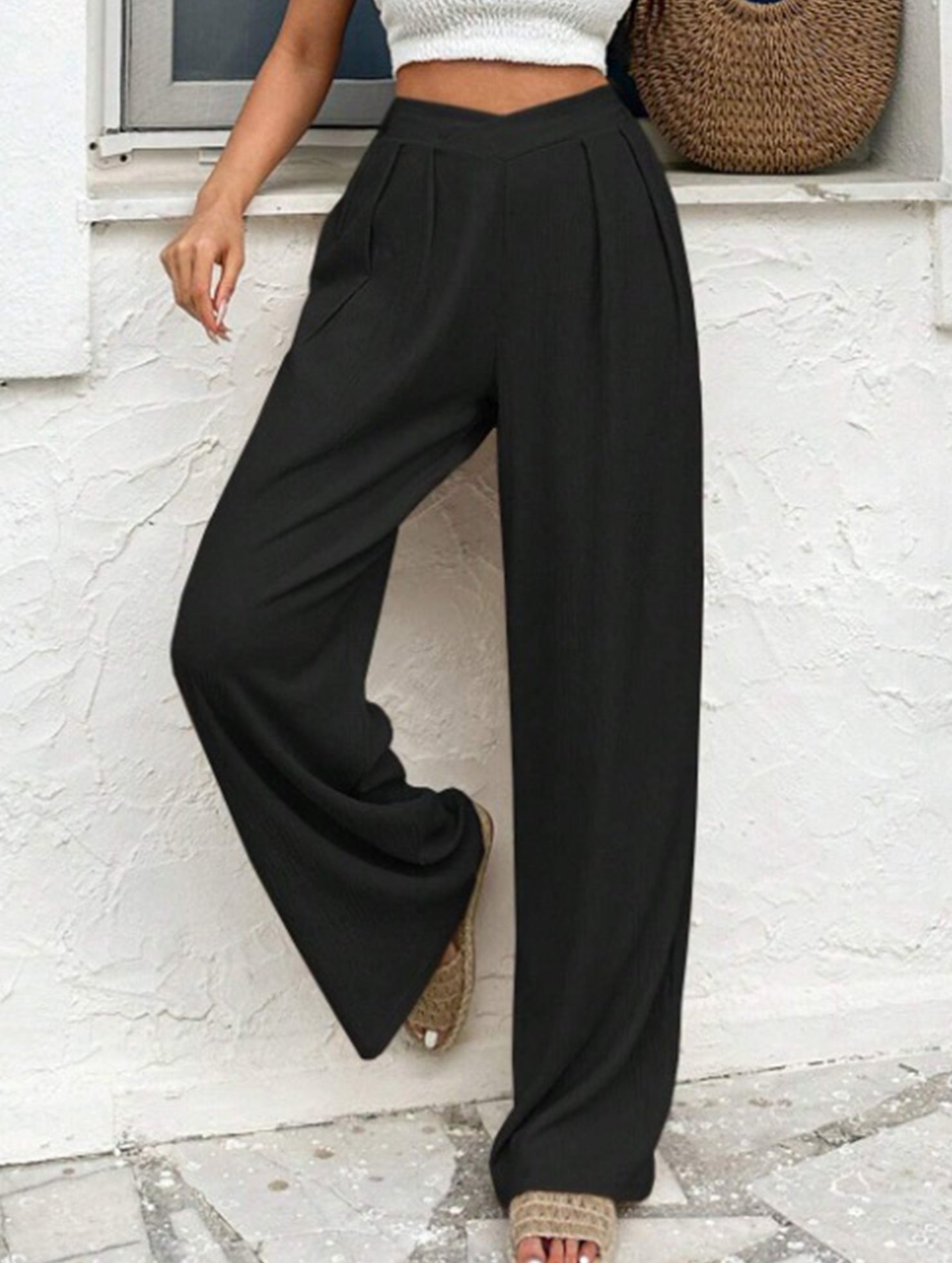 Cross-pleated high-waisted loose-fitting trousers
