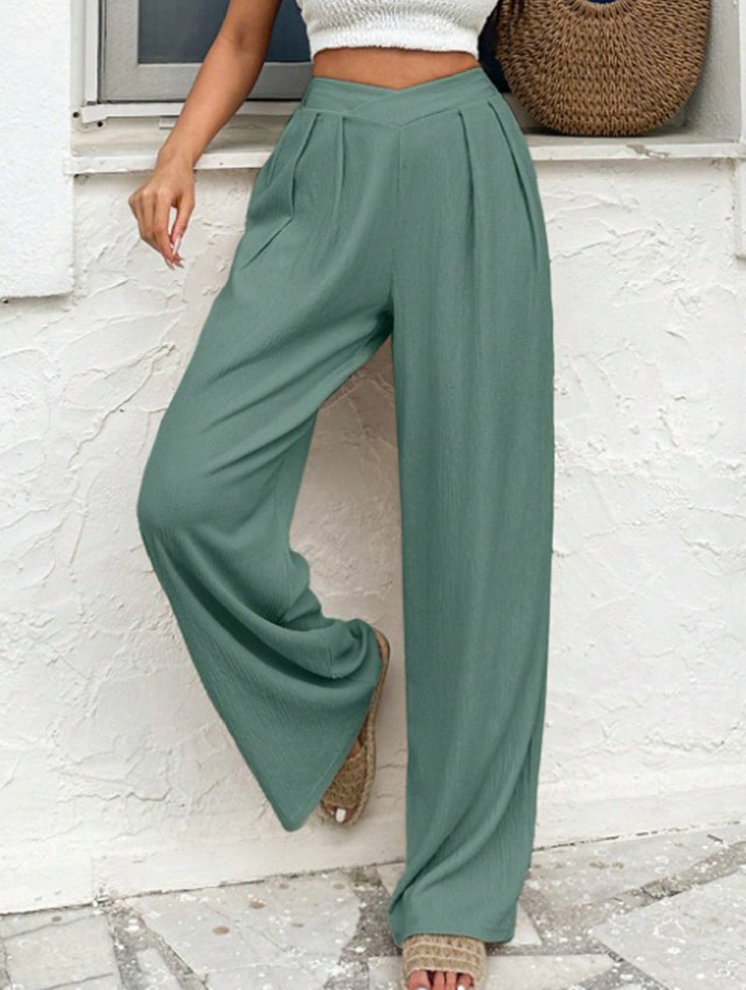 Cross-pleated high-waisted loose-fitting trousers