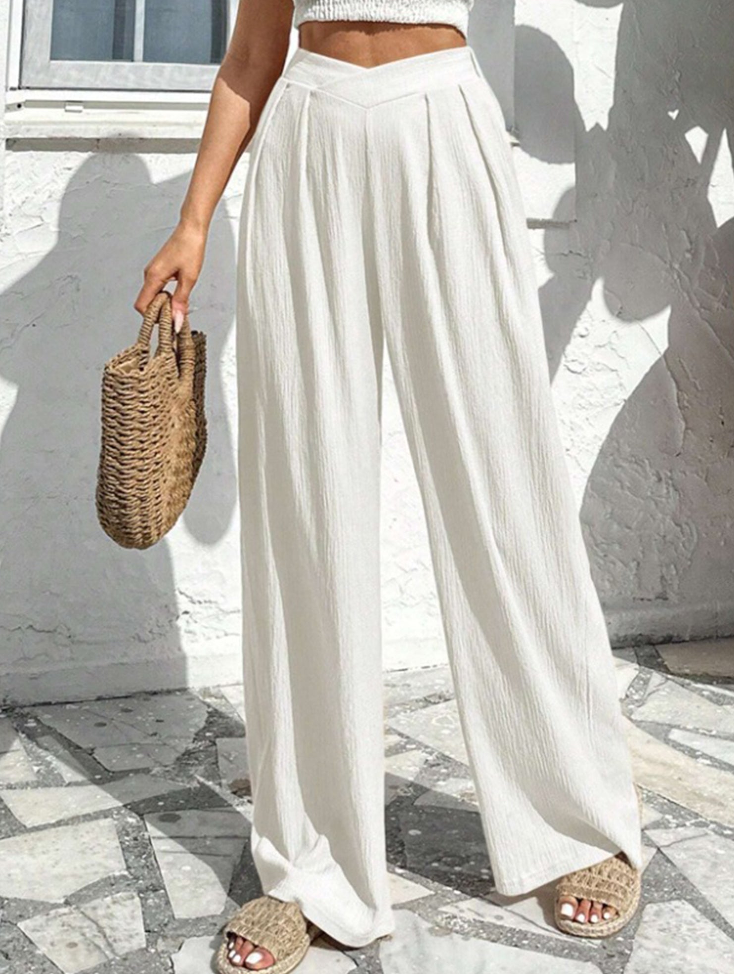 Cross-pleated high-waisted loose-fitting trousers