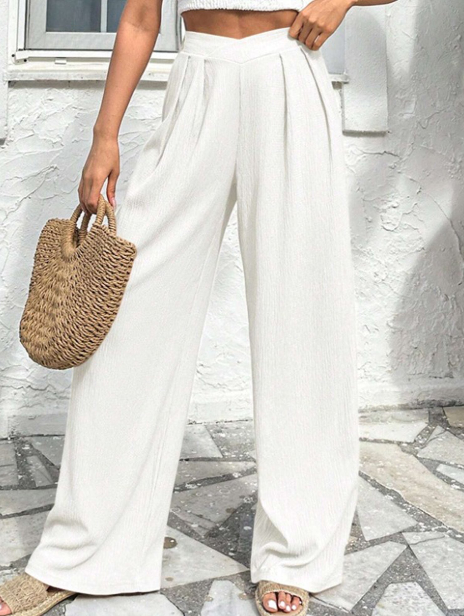 Cross-pleated high-waisted loose-fitting trousers