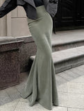 waist-hugging floor-length skirt