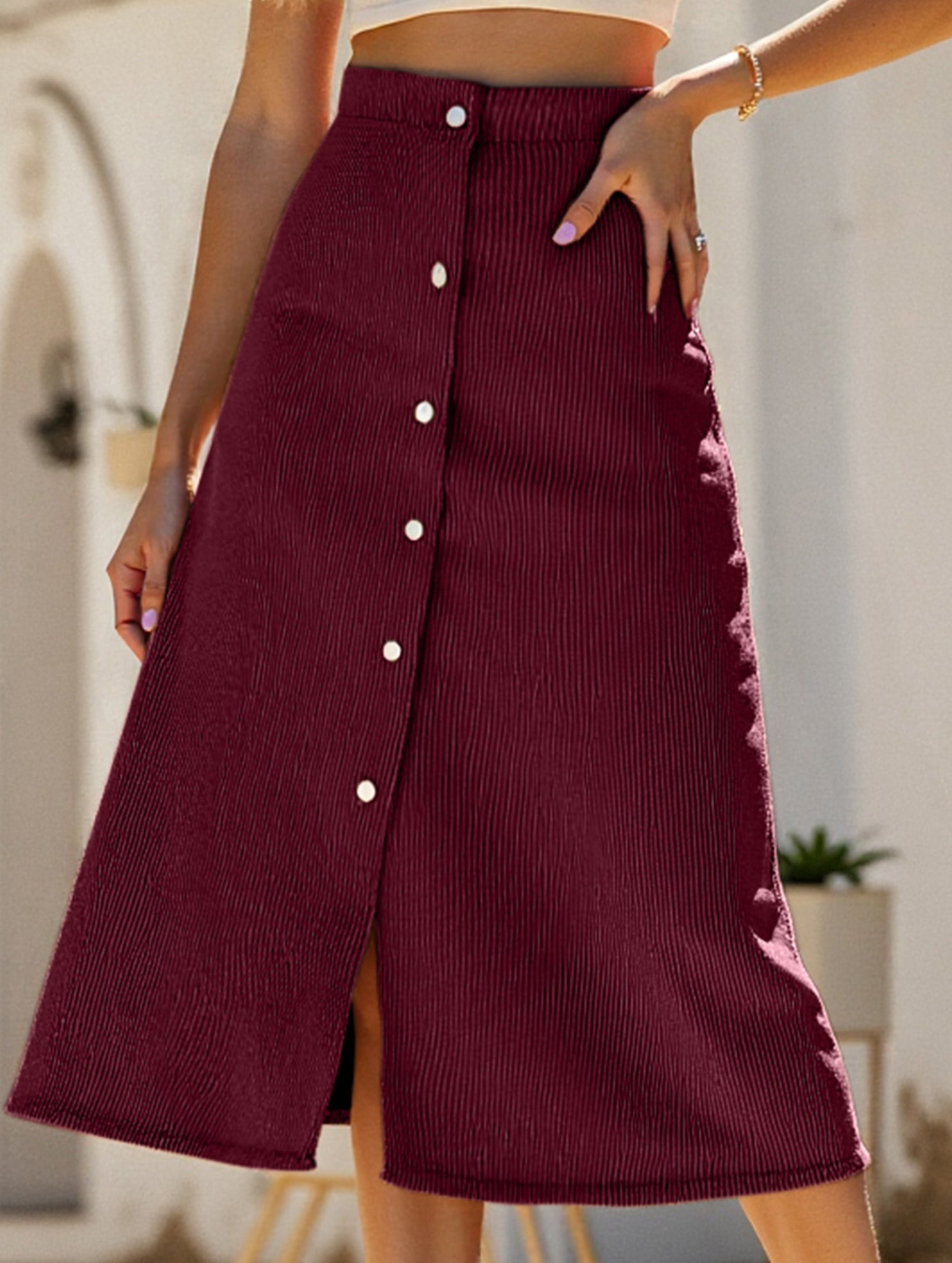 Single-breasted high-waisted corduroy midi skirt