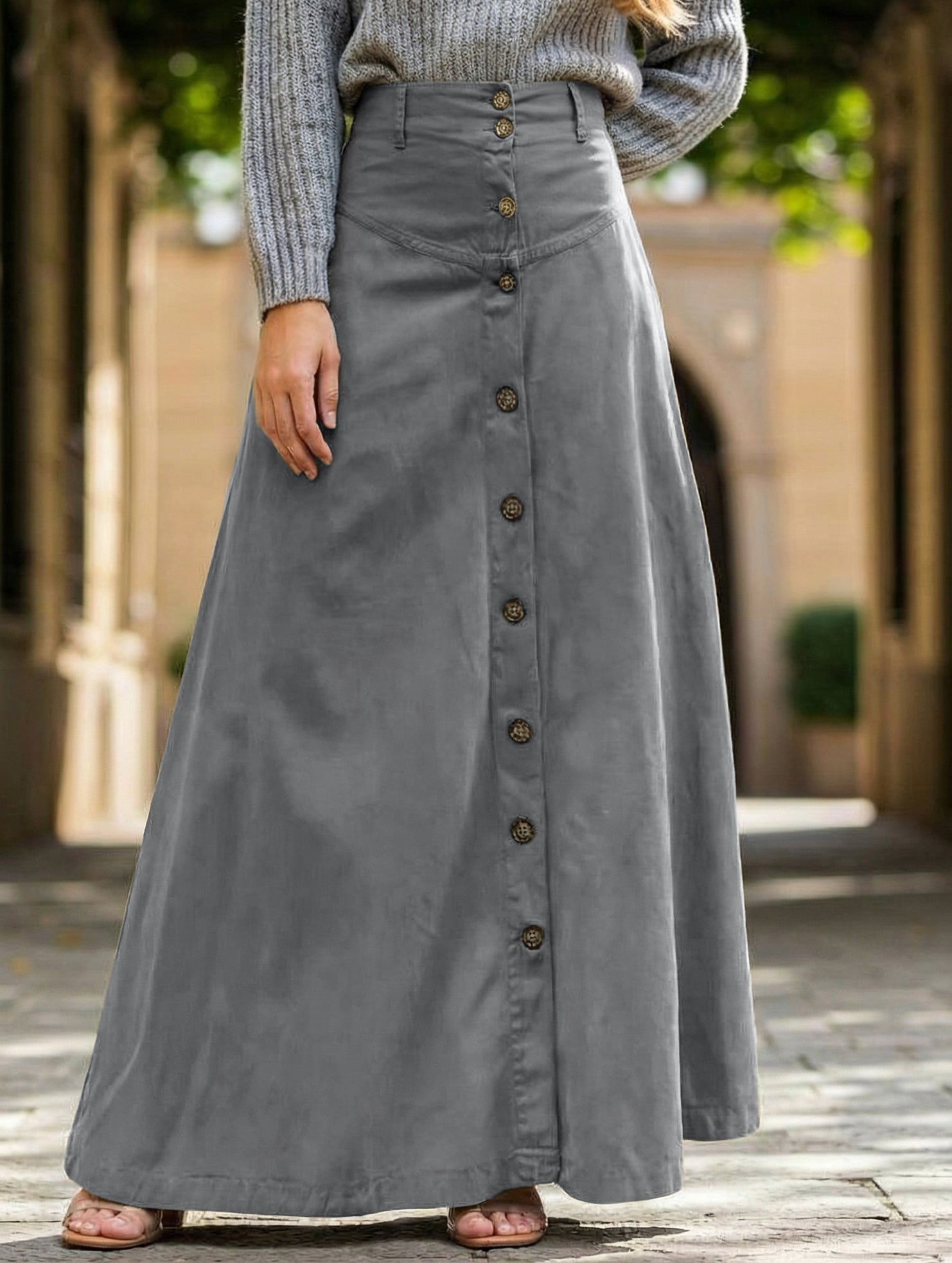 A-line high-waisted midi skirt with button front slit