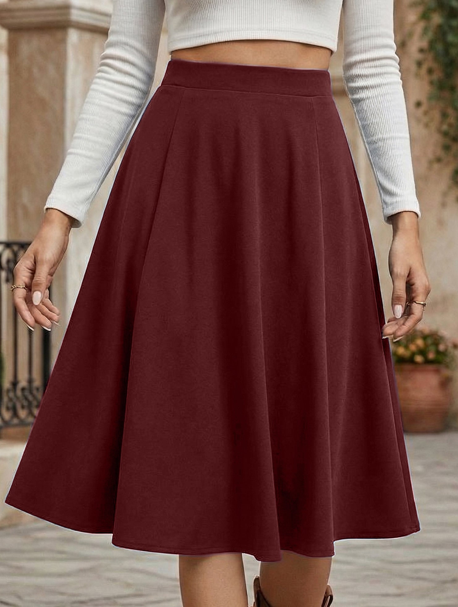 High-waisted pleated midi skirt