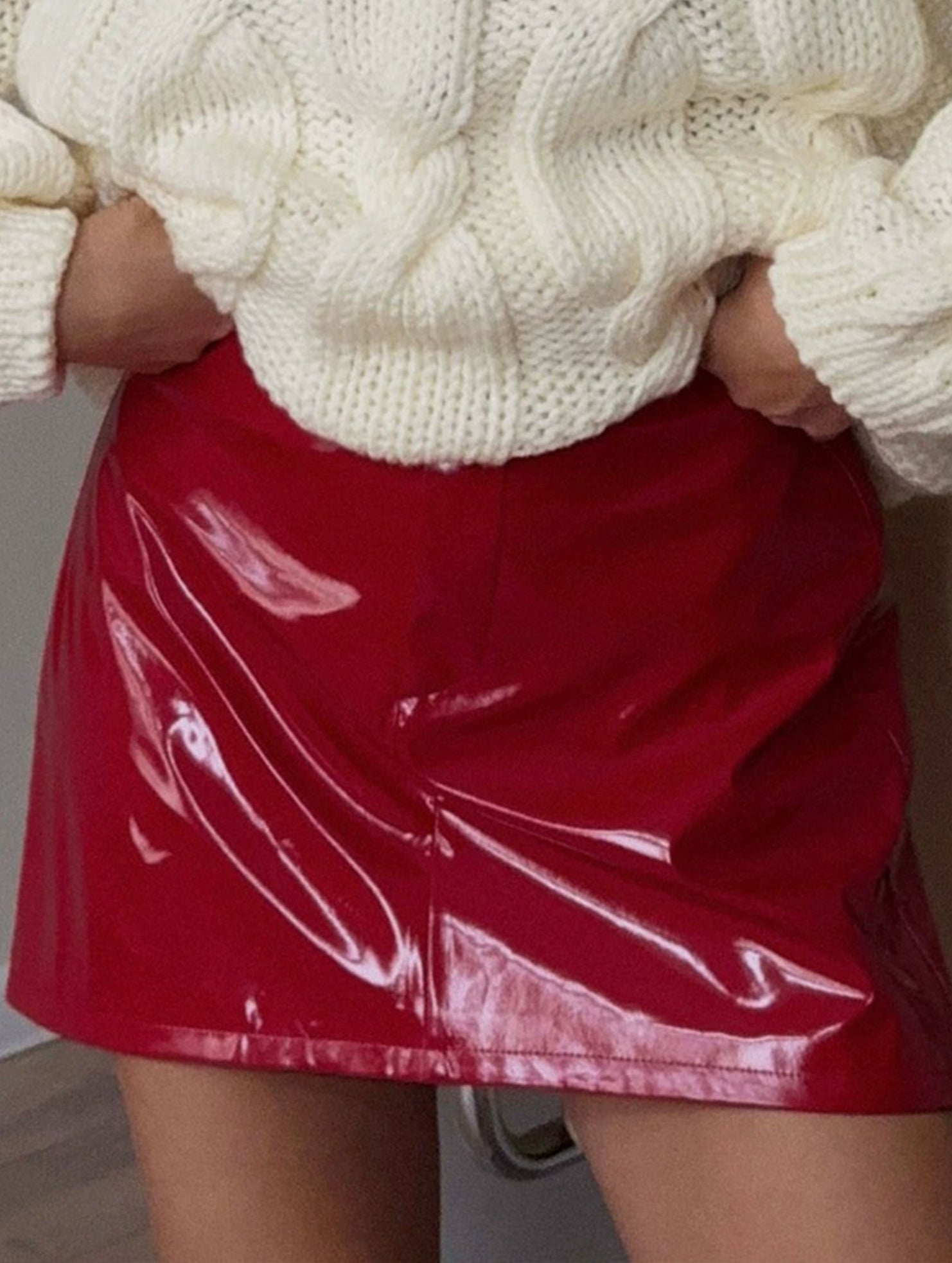 Spicy red patent leather mini skirt