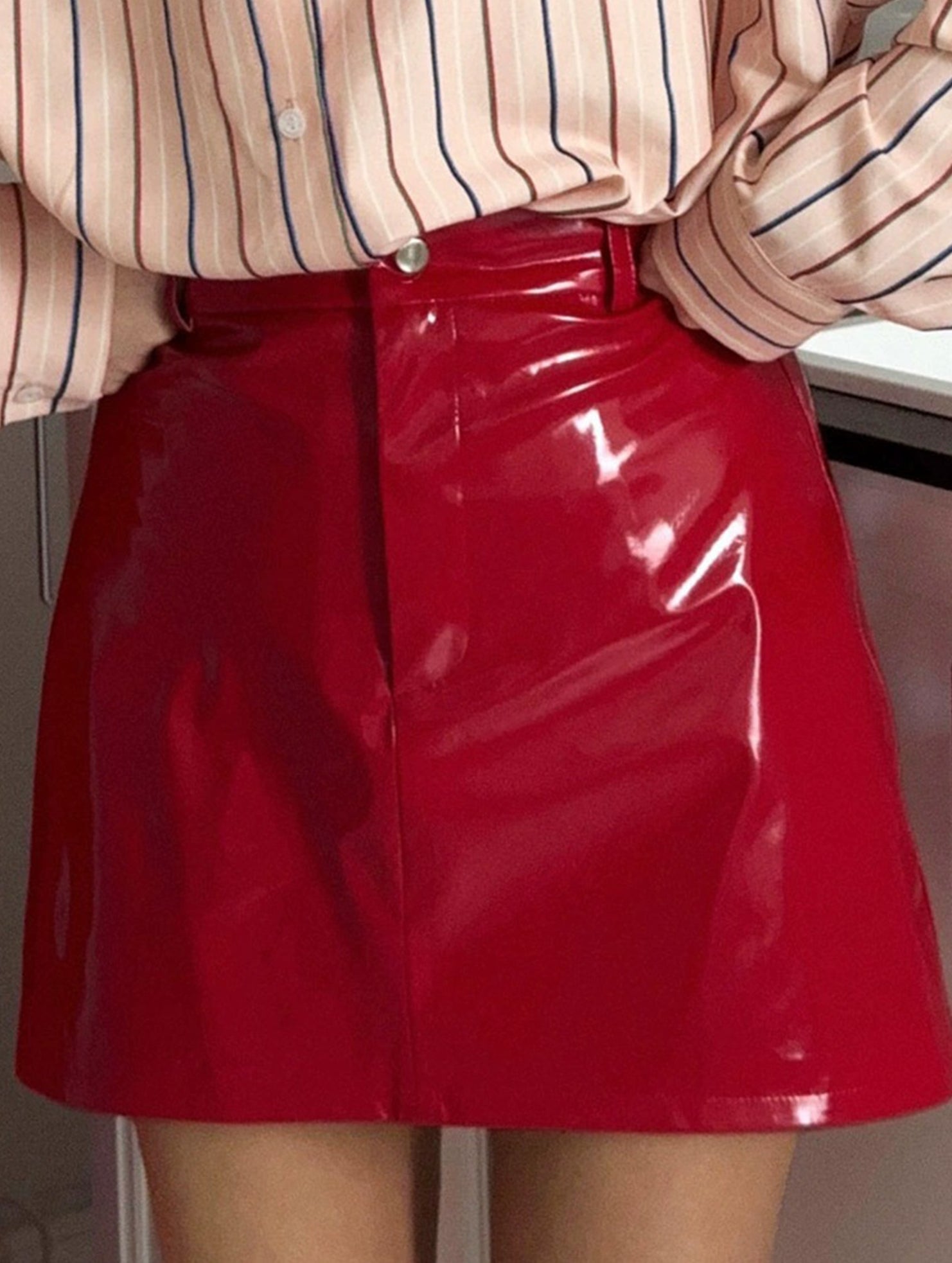 Spicy red patent leather mini skirt