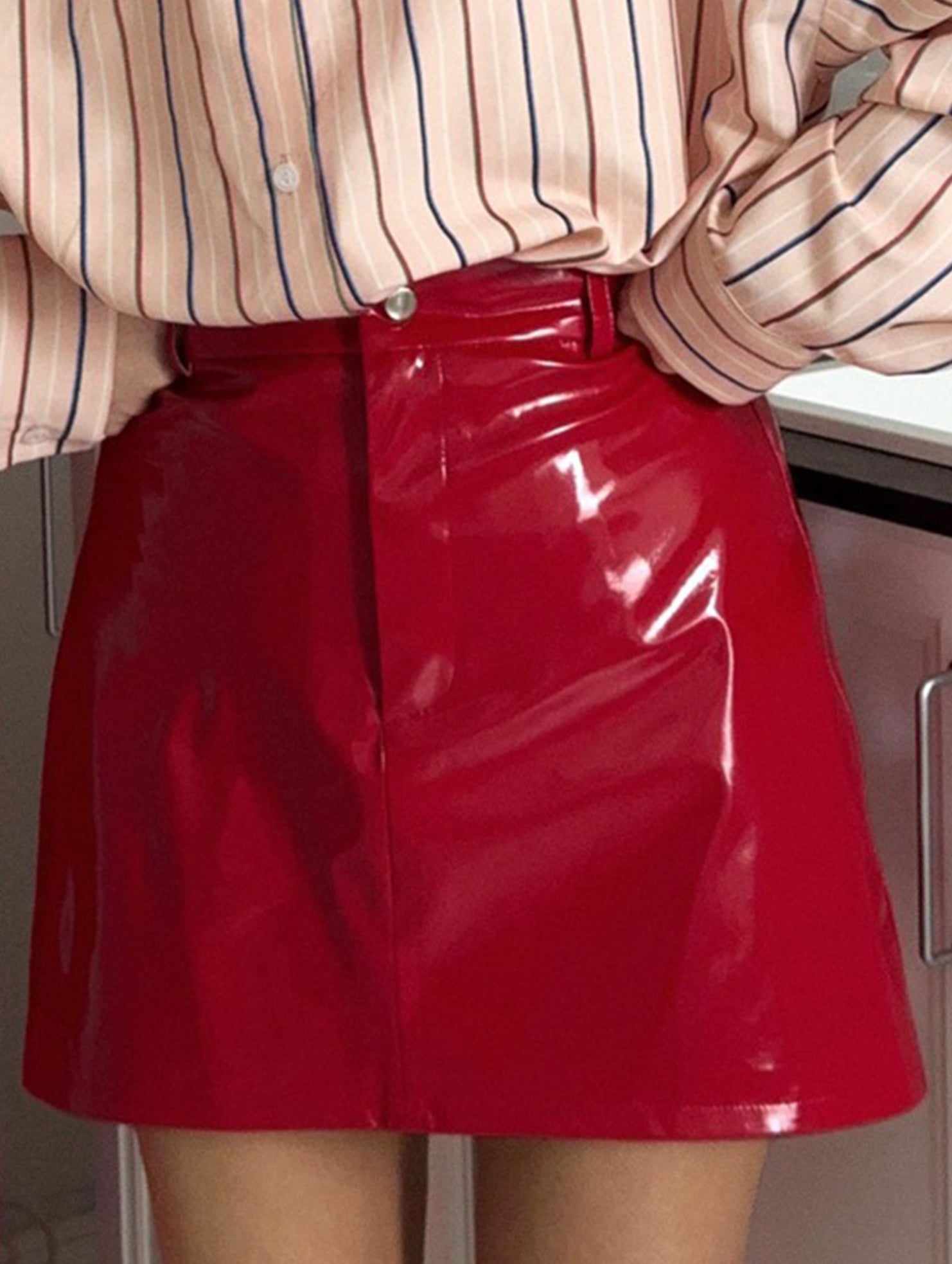Spicy red patent leather mini skirt