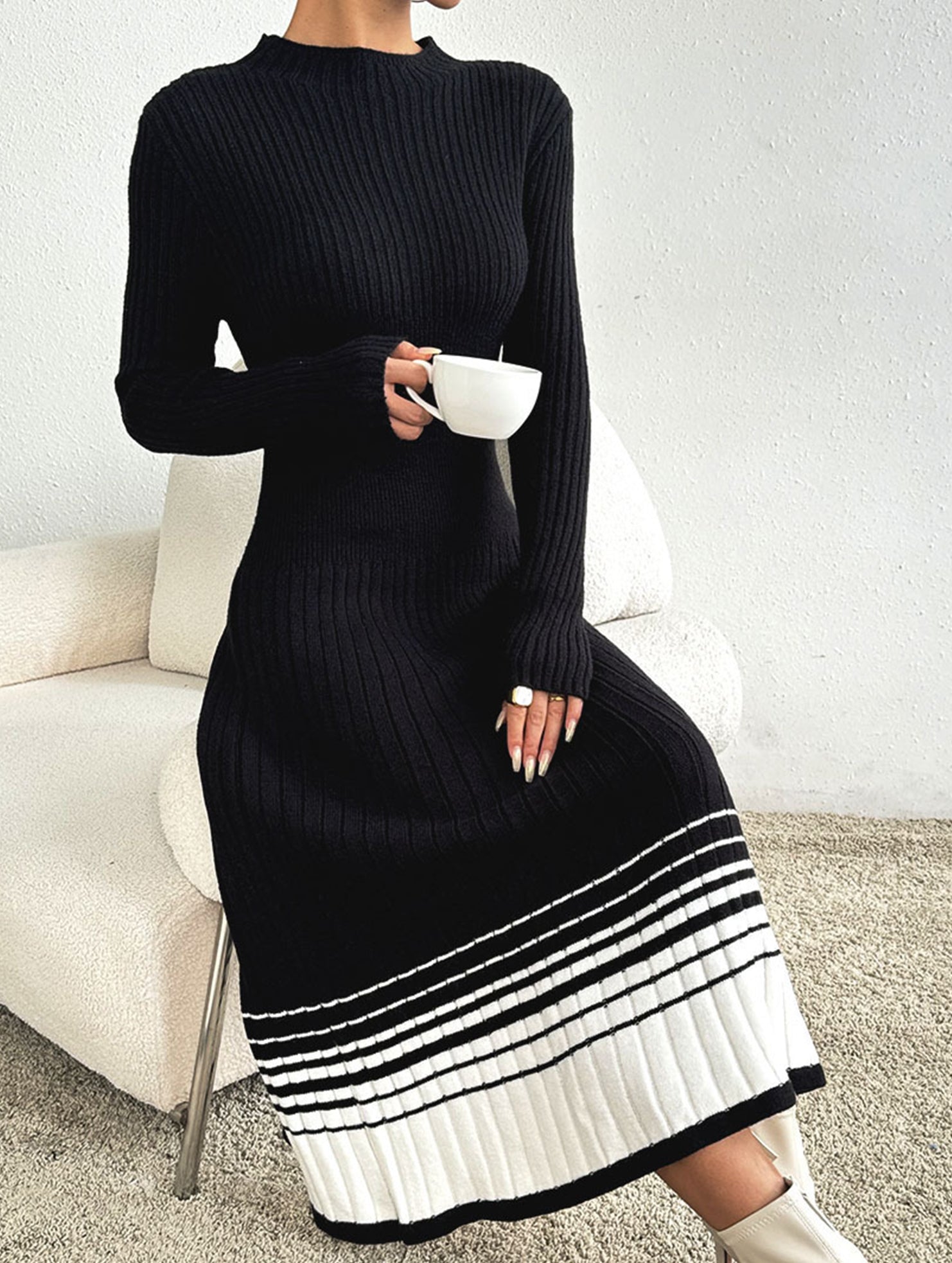 Pleated black and white striped sweater dress