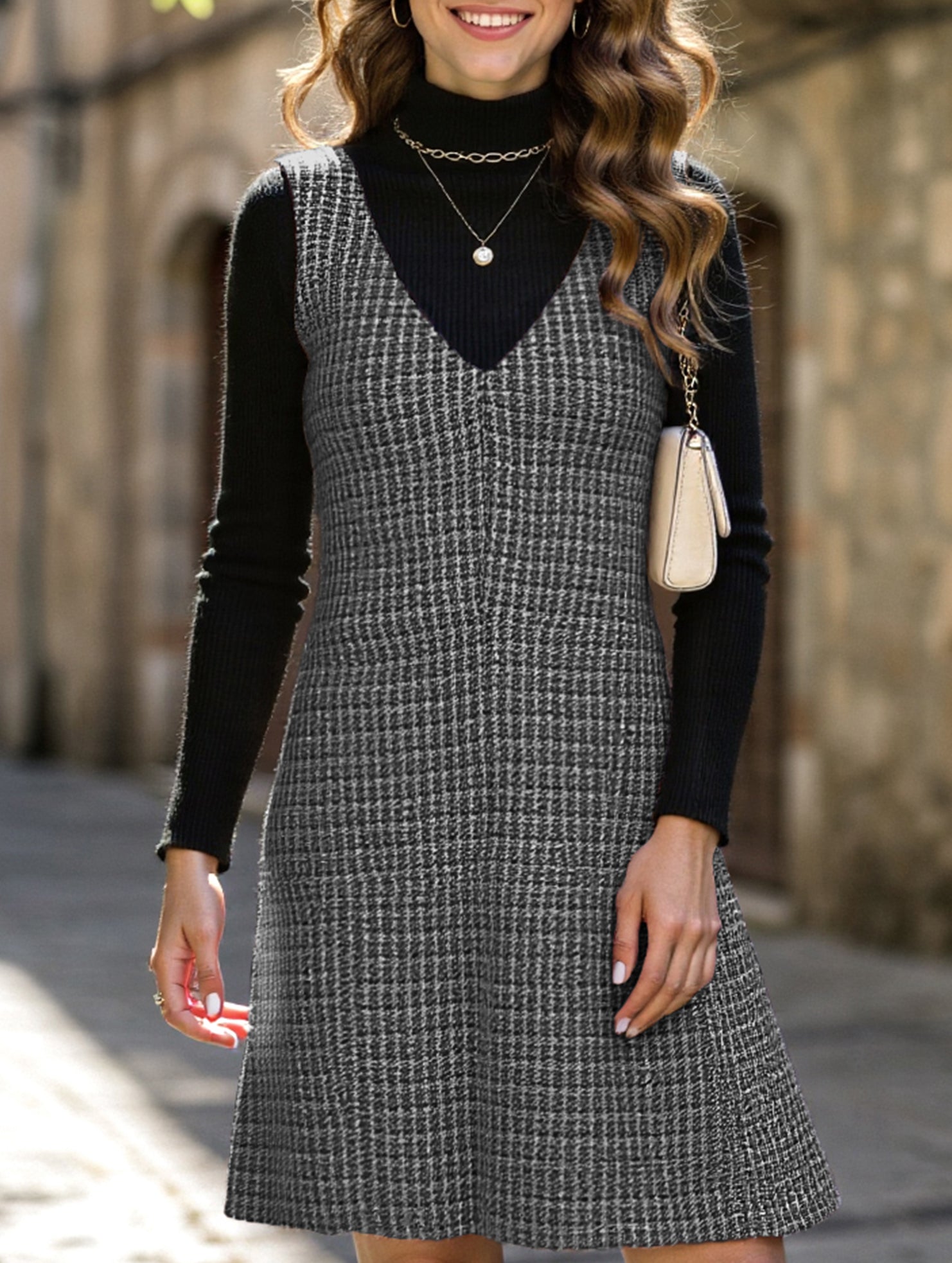 Sleeveless midi dress with suspenders and V-neck