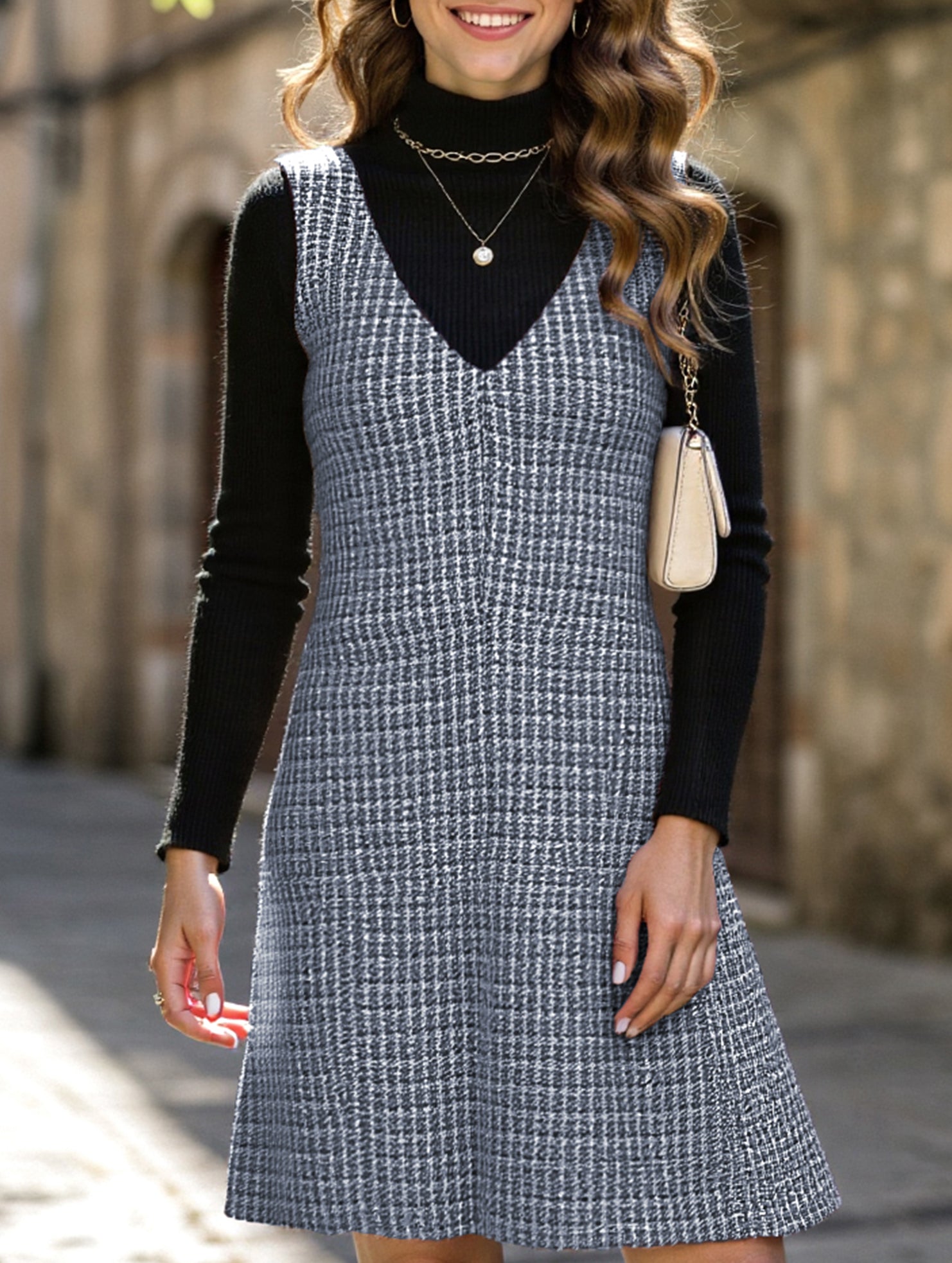 Sleeveless midi dress with suspenders and V-neck