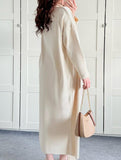 Slim-fitting turtleneck dress and cardigan set