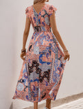 Resort-style midi dress with paisley floral print