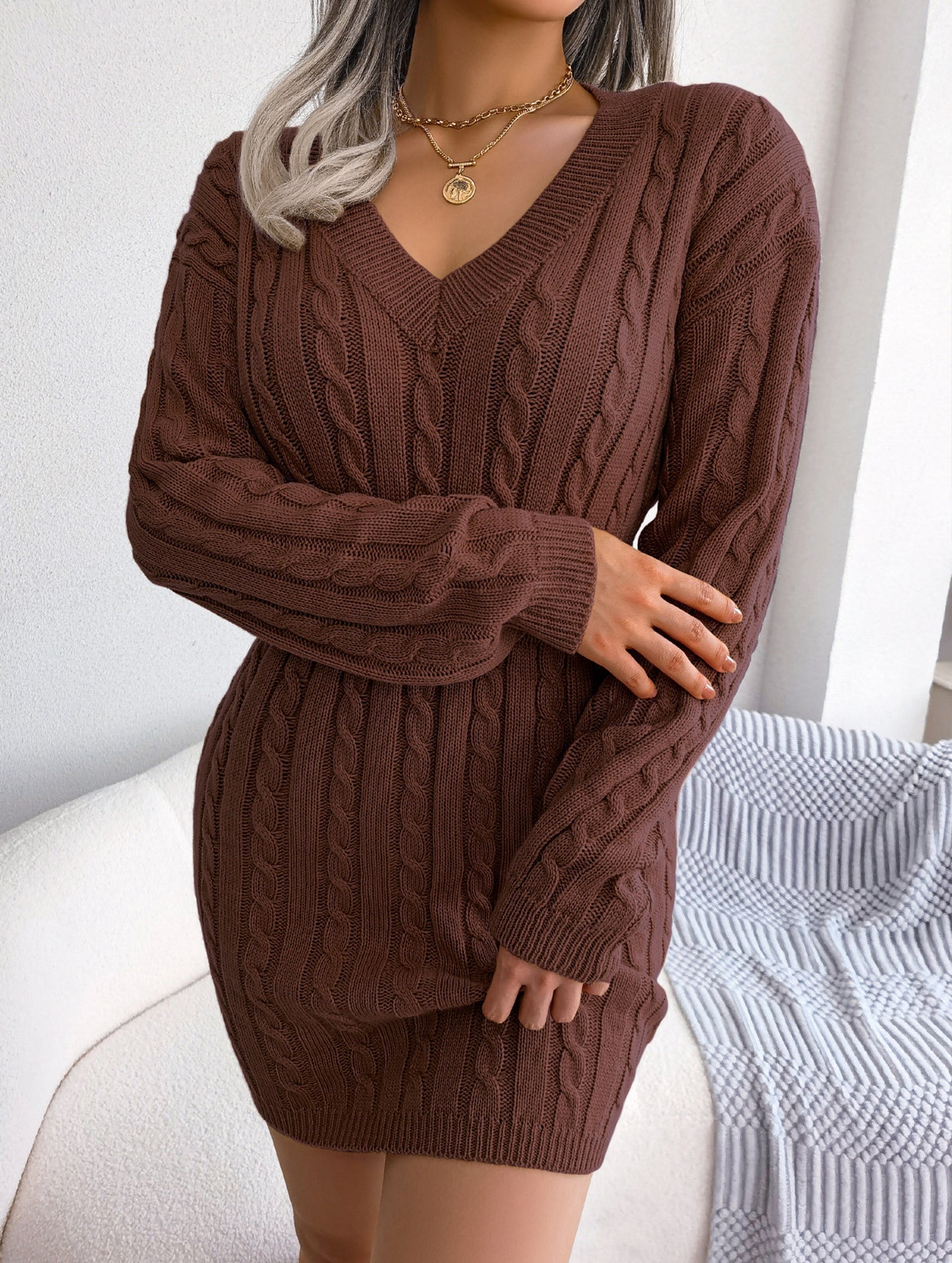 Fashionable waist-hugging cable-knitted hip dress