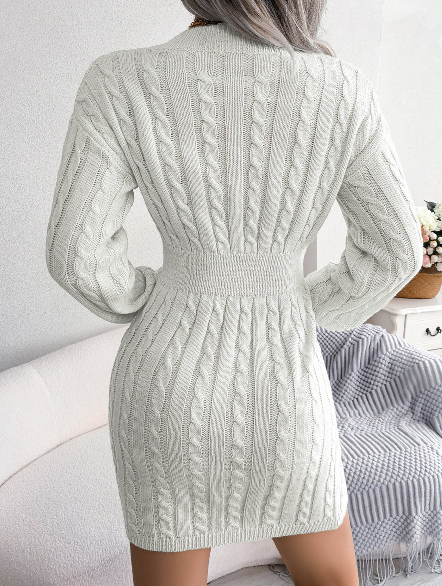 Fashionable waist-hugging cable-knitted hip dress