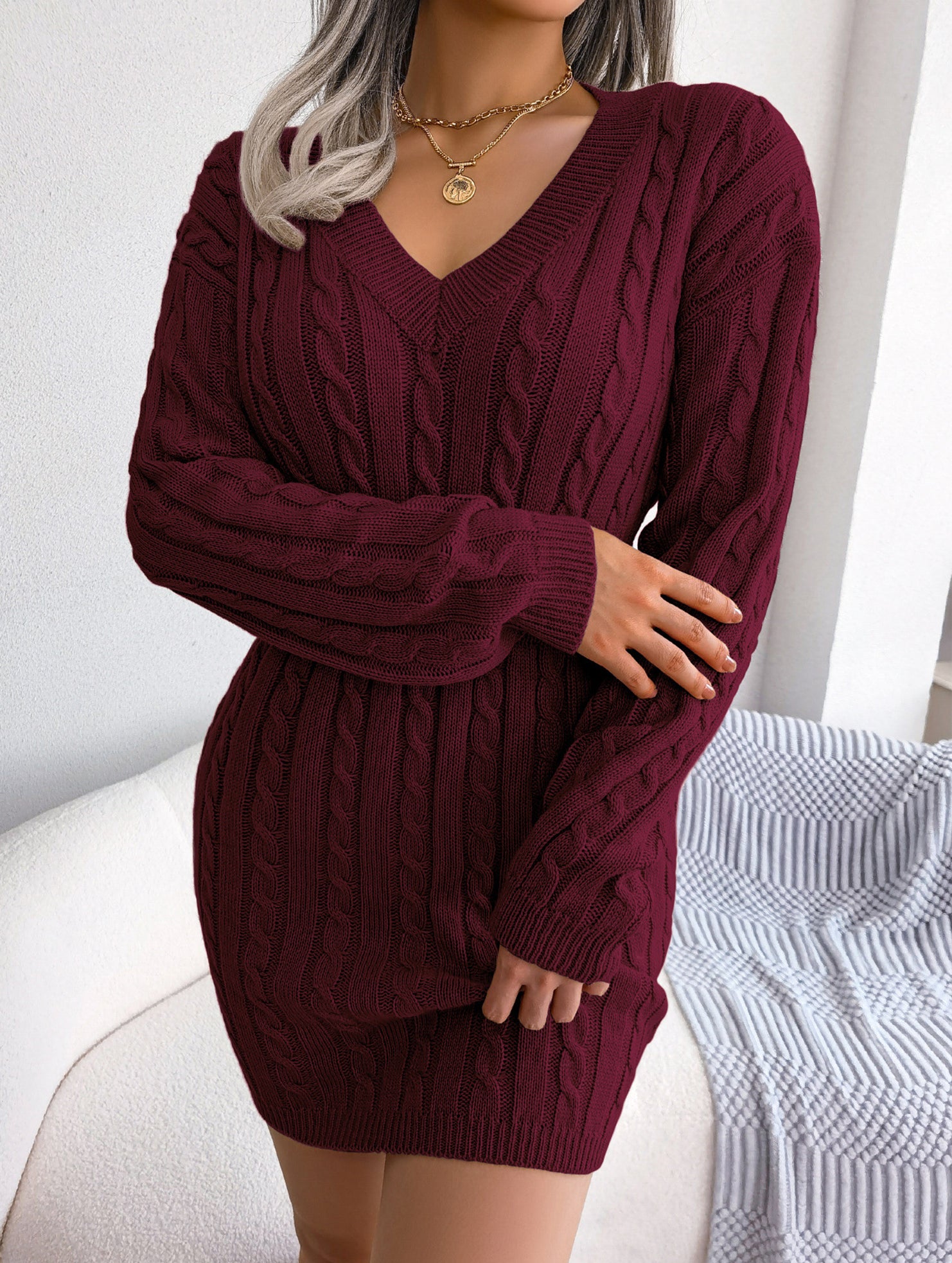 Fashionable waist-hugging cable-knitted hip dress