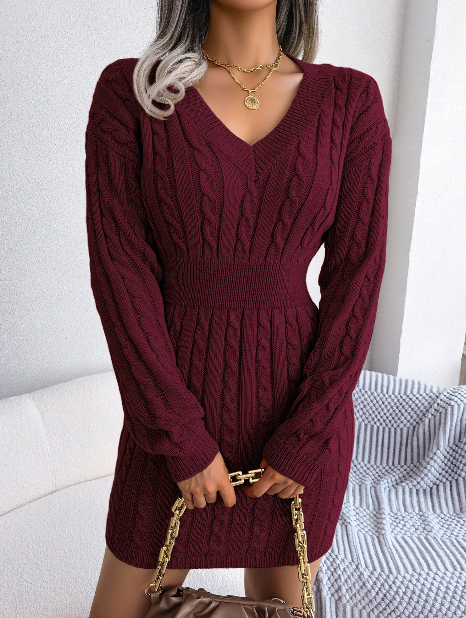Fashionable waist-hugging cable-knitted hip dress