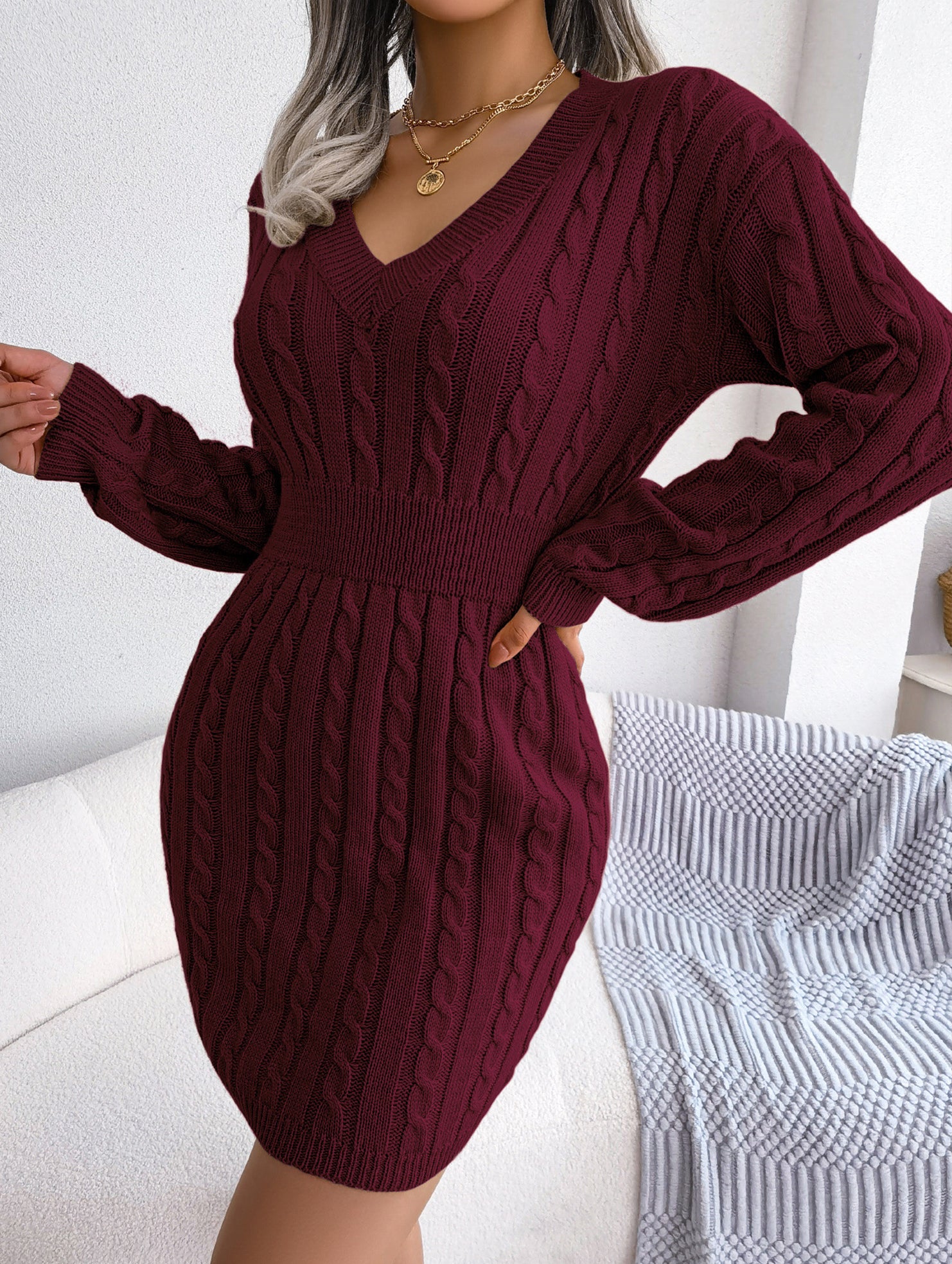 Fashionable waist-hugging cable-knitted hip dress