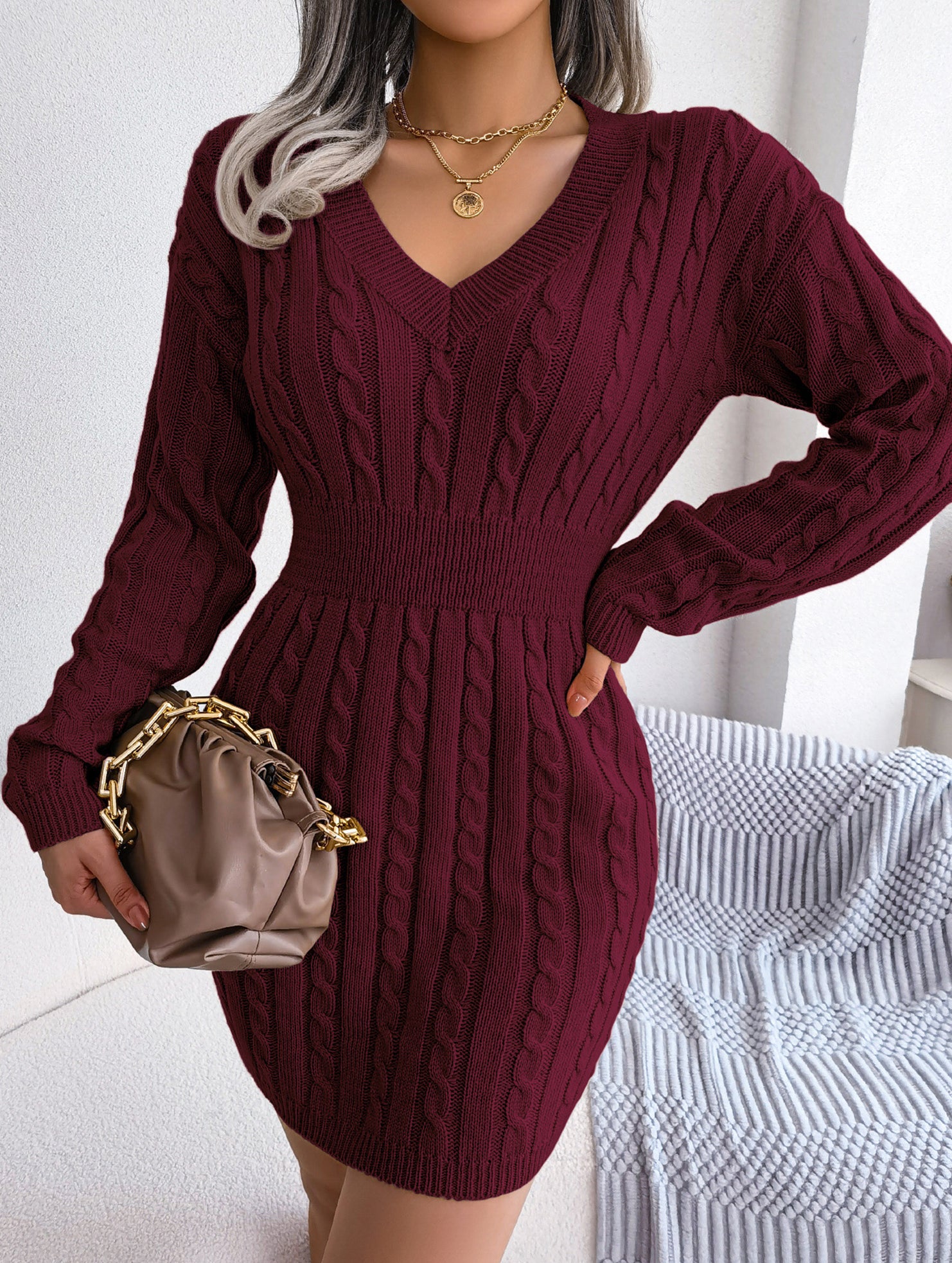 Fashionable waist-hugging cable-knitted hip dress
