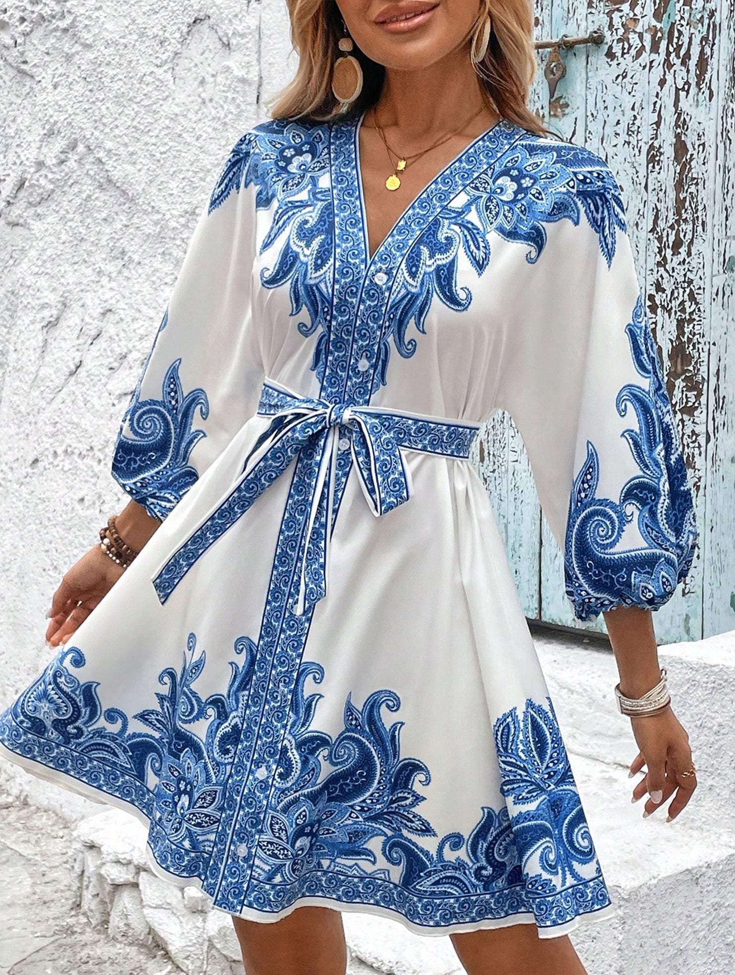 Printed V-neck three-quarter sleeve tie-waist dress