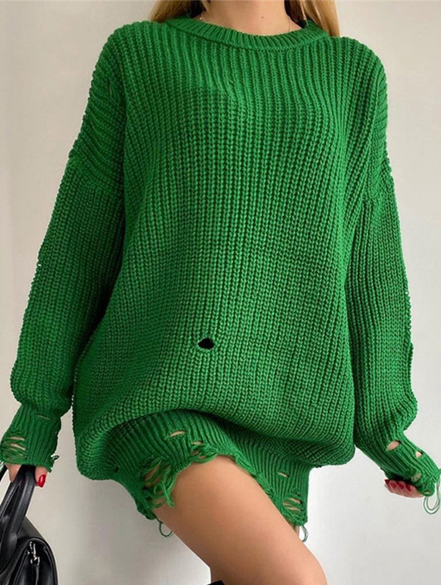 Round neck and ripped hem loose knit sweater