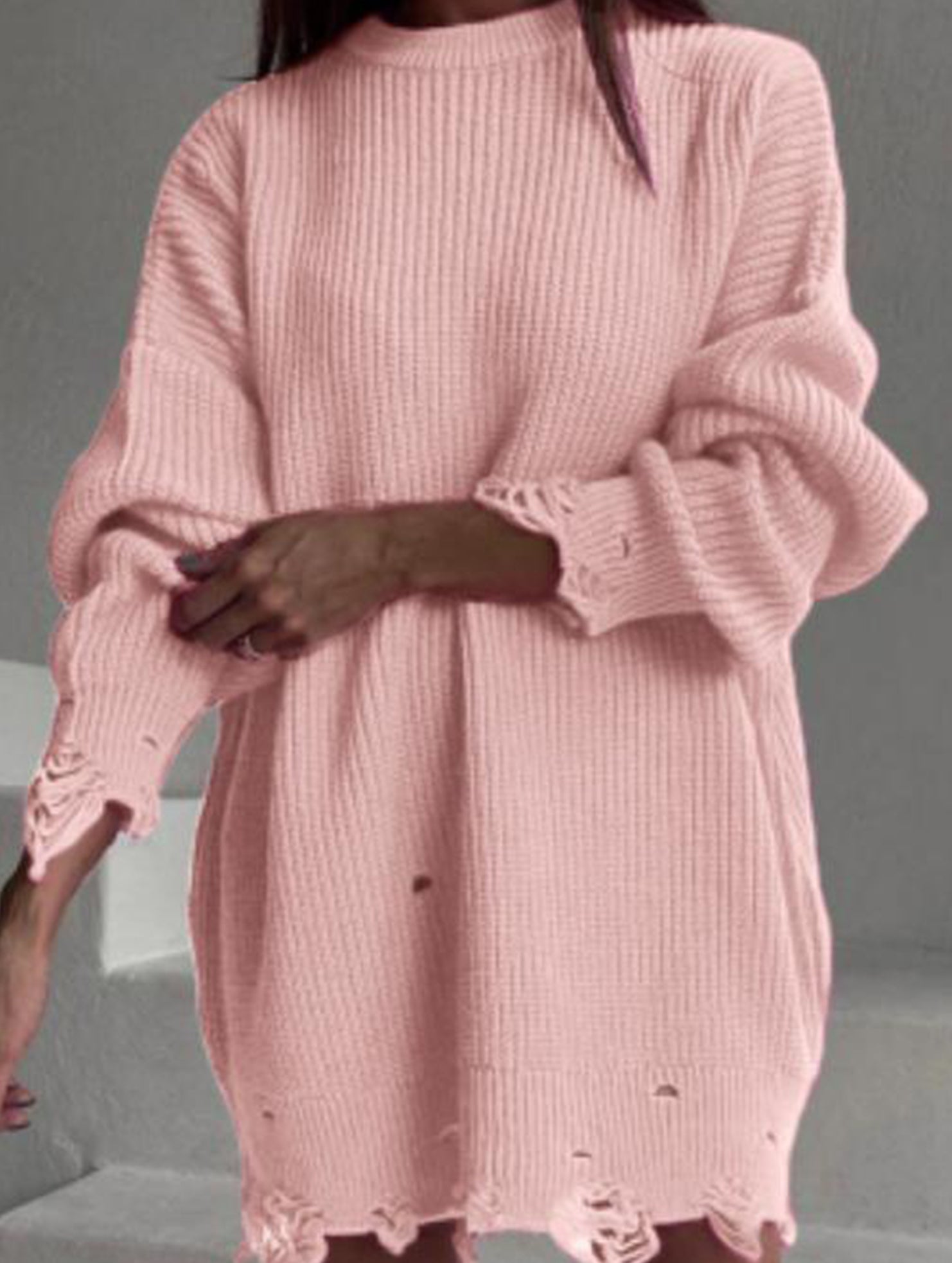 Round neck and ripped hem loose knit sweater