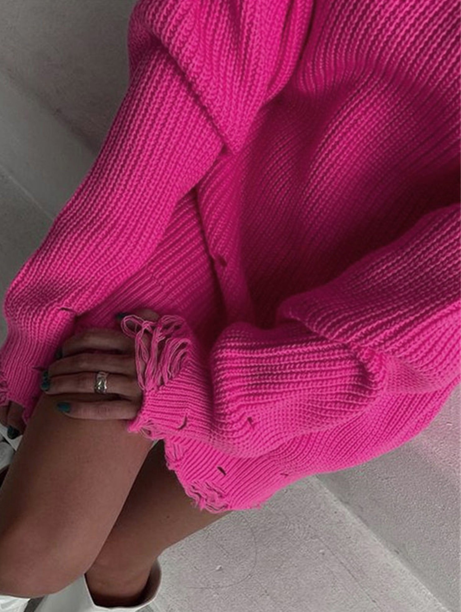 Round neck and ripped hem loose knit sweater