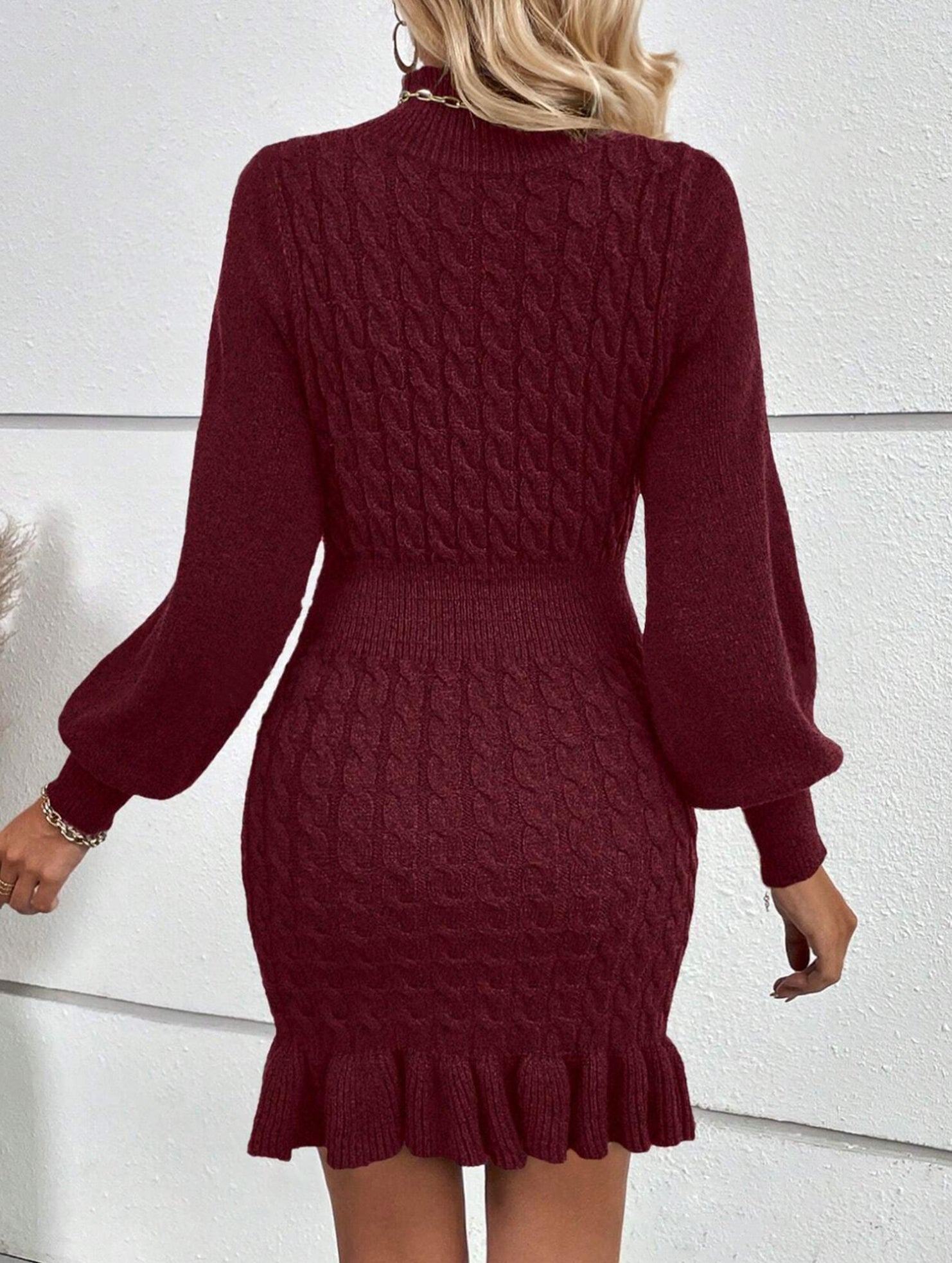 Fashionable cable knit waist-cinching sweater dress
