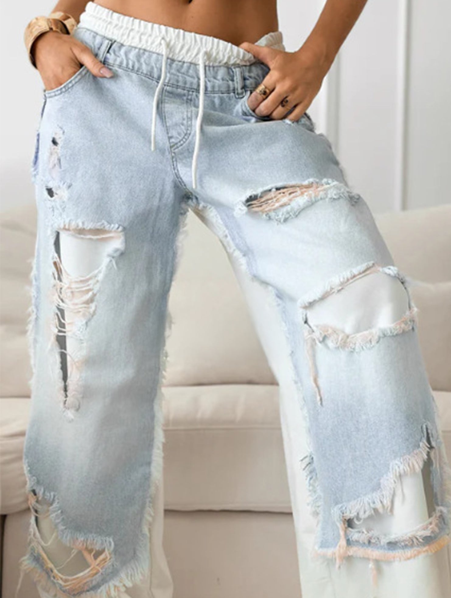 Personalized ripped lace-up jeans